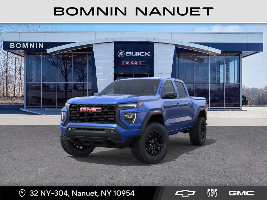 2026 GMC Canyon Elevation in Rapids Metallic — front three-quarter view