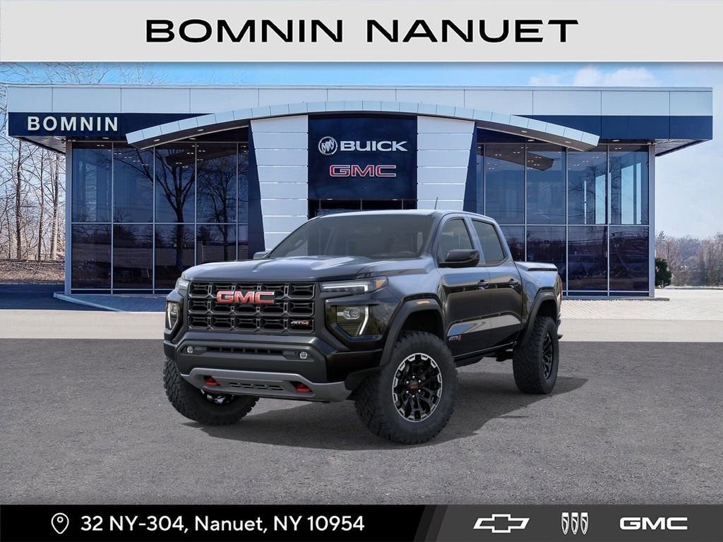 2026 GMC Canyon AT4 in Onyx Black — front three-quarter view