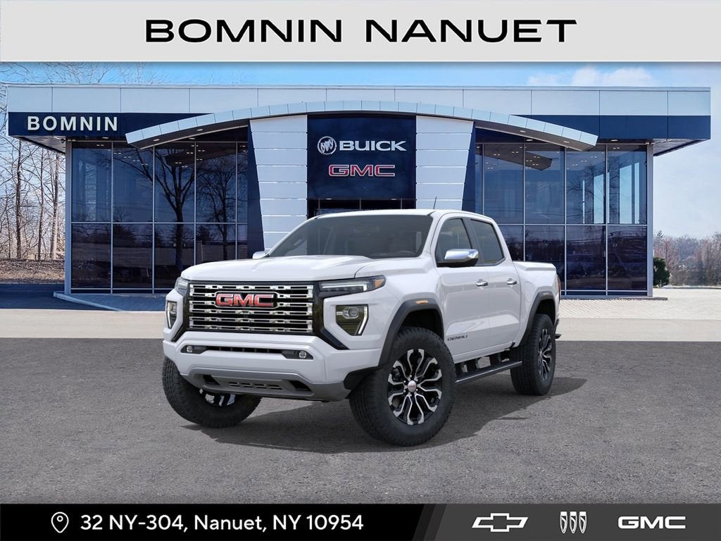 2026 GMC Canyon Denali in Summit White — front three-quarter view