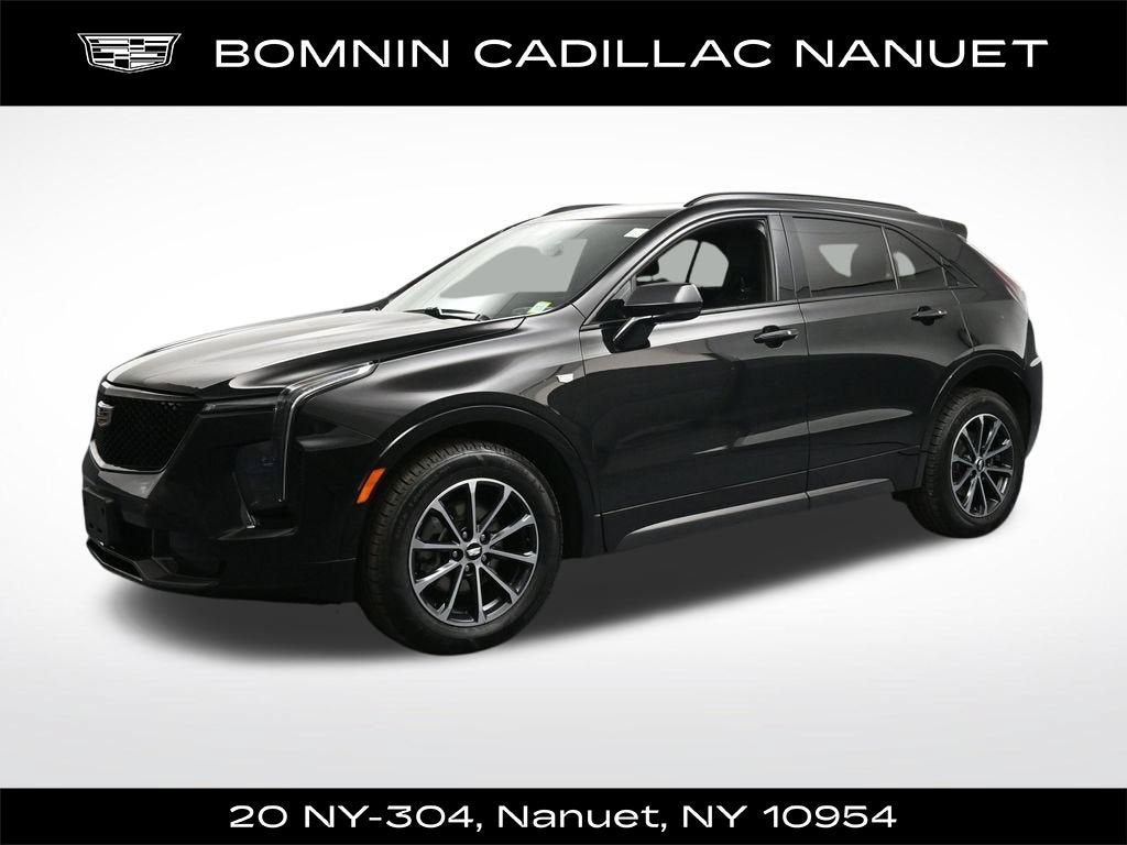 2024 Cadillac XT4 Sport in Stellar Black Metallic — front three-quarter view