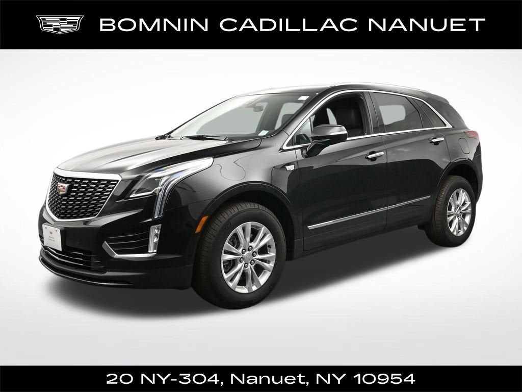 2025 Cadillac XT5 Luxury in Stellar Black Metallic — front three-quarter view