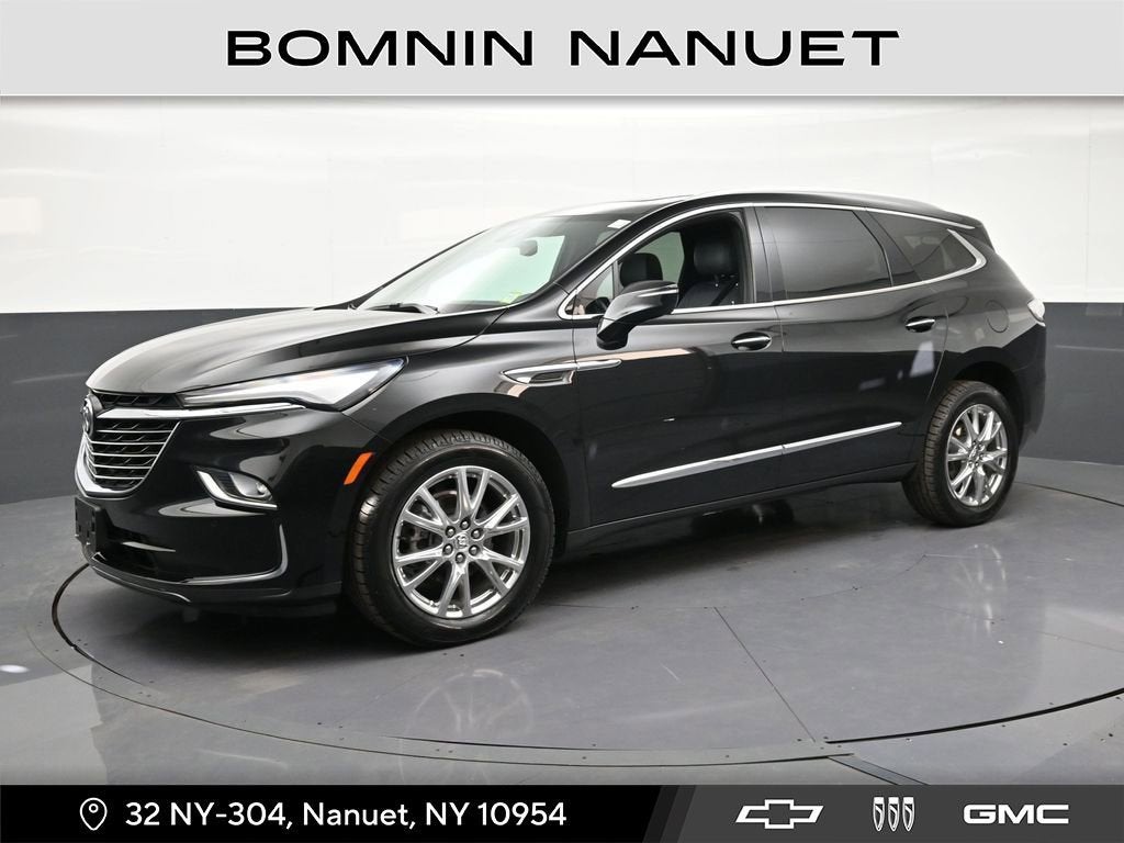 2023 Buick Enclave Essence in Ebony Twilight Metallic — front three-quarter view
